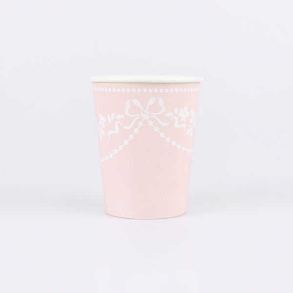 Our paper cups have a pretty pastel pink colour with white ornamental patterns, ideal for sophisticated servings of hot or cold drinks. Image1
