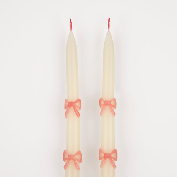 Our party candles feature handpainted pink bows and pretty pink wicks. Image3
