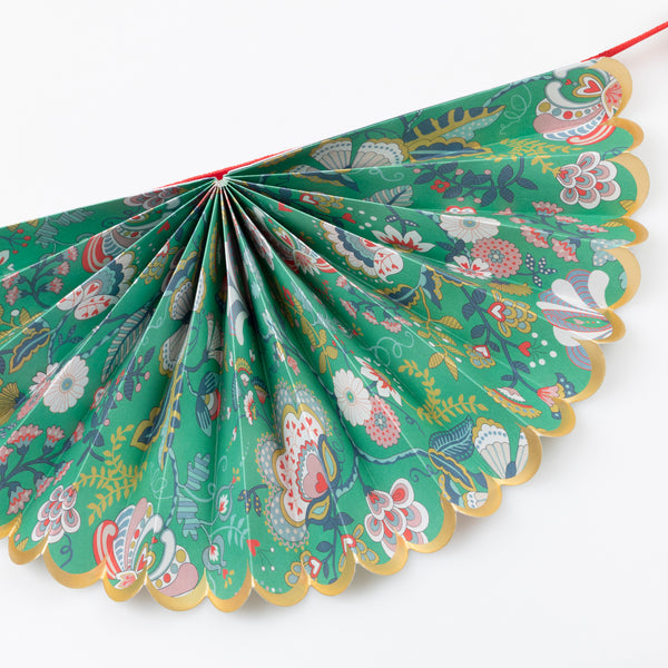 Our elegant Christmas garland has Liberty prints and matt gold foil details, pre-threaded on to a stylish red velvet ribbon. Image4