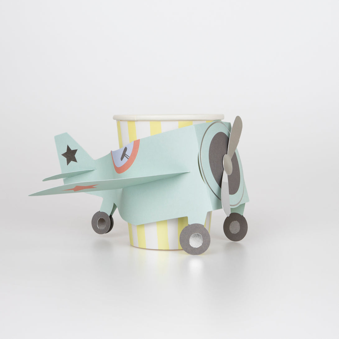 Kids who love airplanes will love our airplane party set which includes an airplane garland, plates, napkins and cups. 