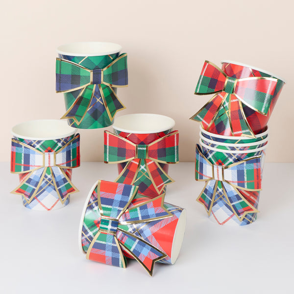 Decorate your Christmas dinner table with our tartan plates, napkins, cups, crackers and add a festive flair with the tartan bow garland. Image12