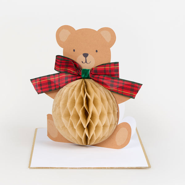 Our cute Christmas card is a teddy bear with an adorable 3D honeycomb stomach and a tartan ribbon bow, perfect as a charming card to send. Image1