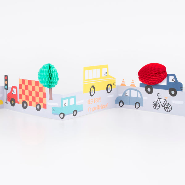 Our concertina card, with lots of colourful vehicles, is the perfect birthday card for a transport-themed party. Image2