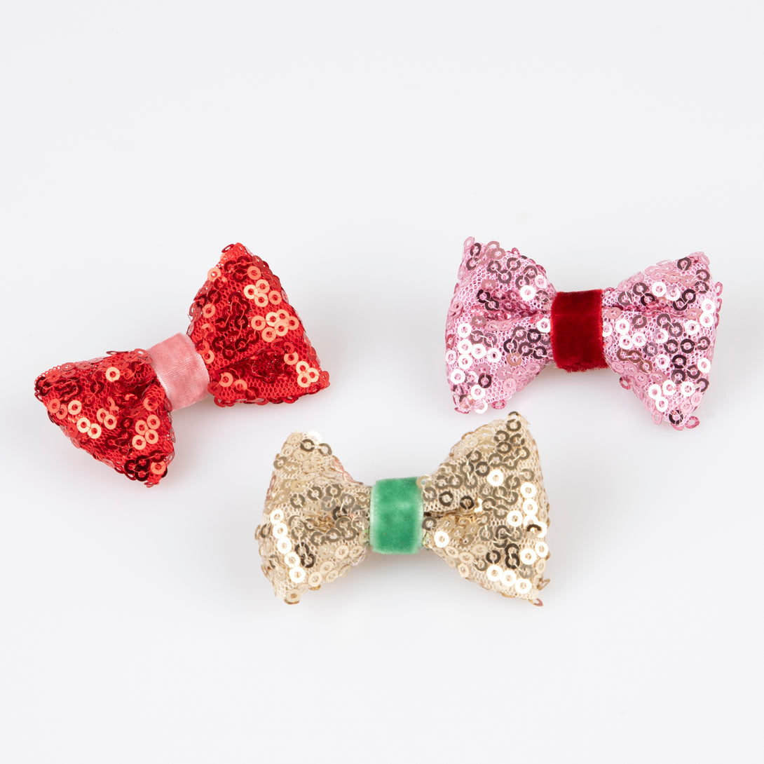 Accessorise your Christmas hairstyle with our sequin bows with velvet details, simply clip on for instant style.