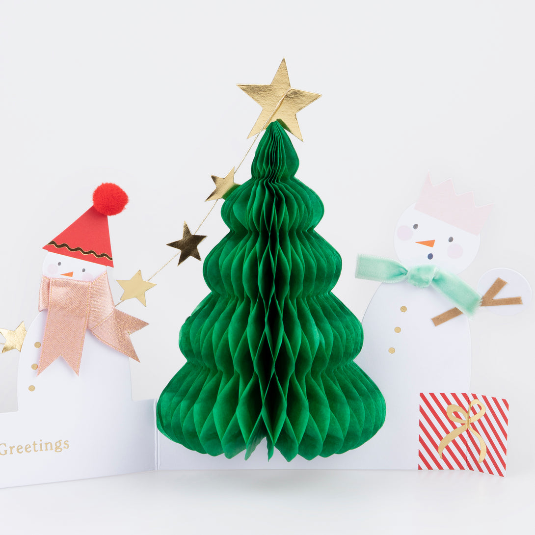 Our snowman card has lots of special embellishments, a 3D Christmas tree and a shiny mini garland, perfect as a Christmas decoration.