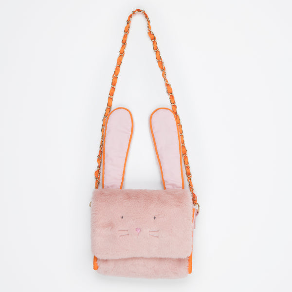 Our kids pink bag is crafted from soft plush in the shape of an adorable bunny with floppy ears. Image4