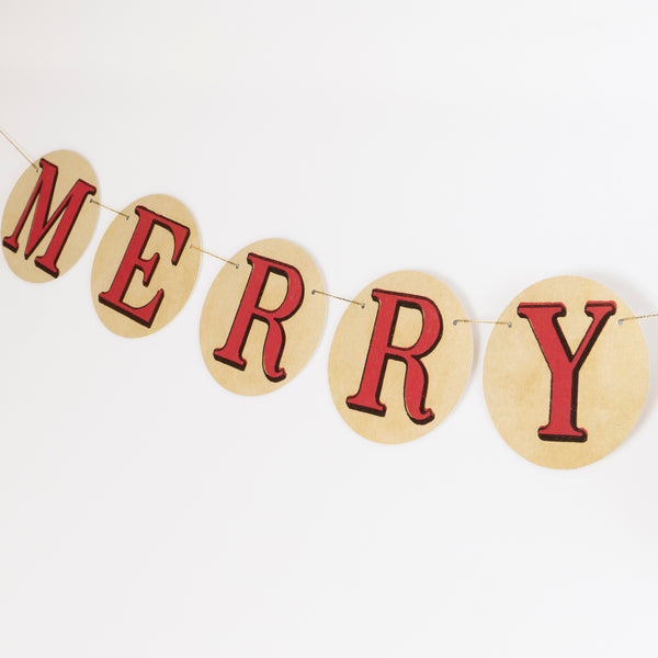 Our Christmas garlands set includes 2, one with foliage and decorative John Derian icons, the other with a Merry Christmas message. Image5