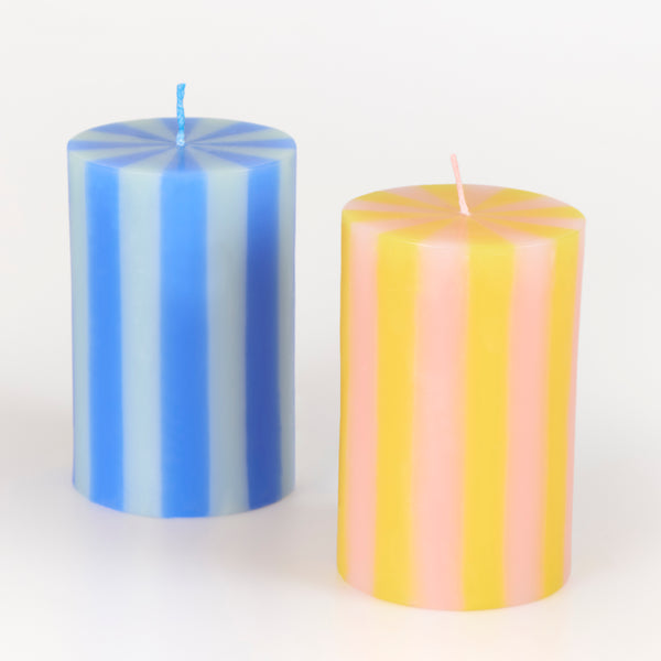 Our striped candles, in a classic pillar shape, feature 5 bright colourways and coloured wicks, perfect for birthday and home decorations. Image2