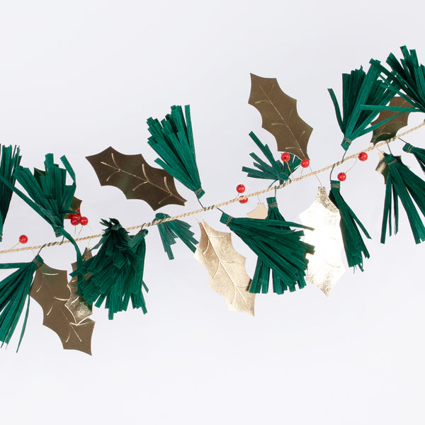 Our festive garland includes holly, berries and pine needles crafted from paper and wooden beads for a special Christmas foliage look. Image3
