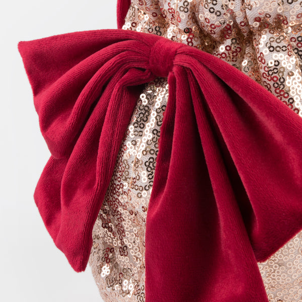 Our Christmas bag is the perfect accessory for Christmas dress up, with pink sequinned tulled and a big red velvet bow. Image3