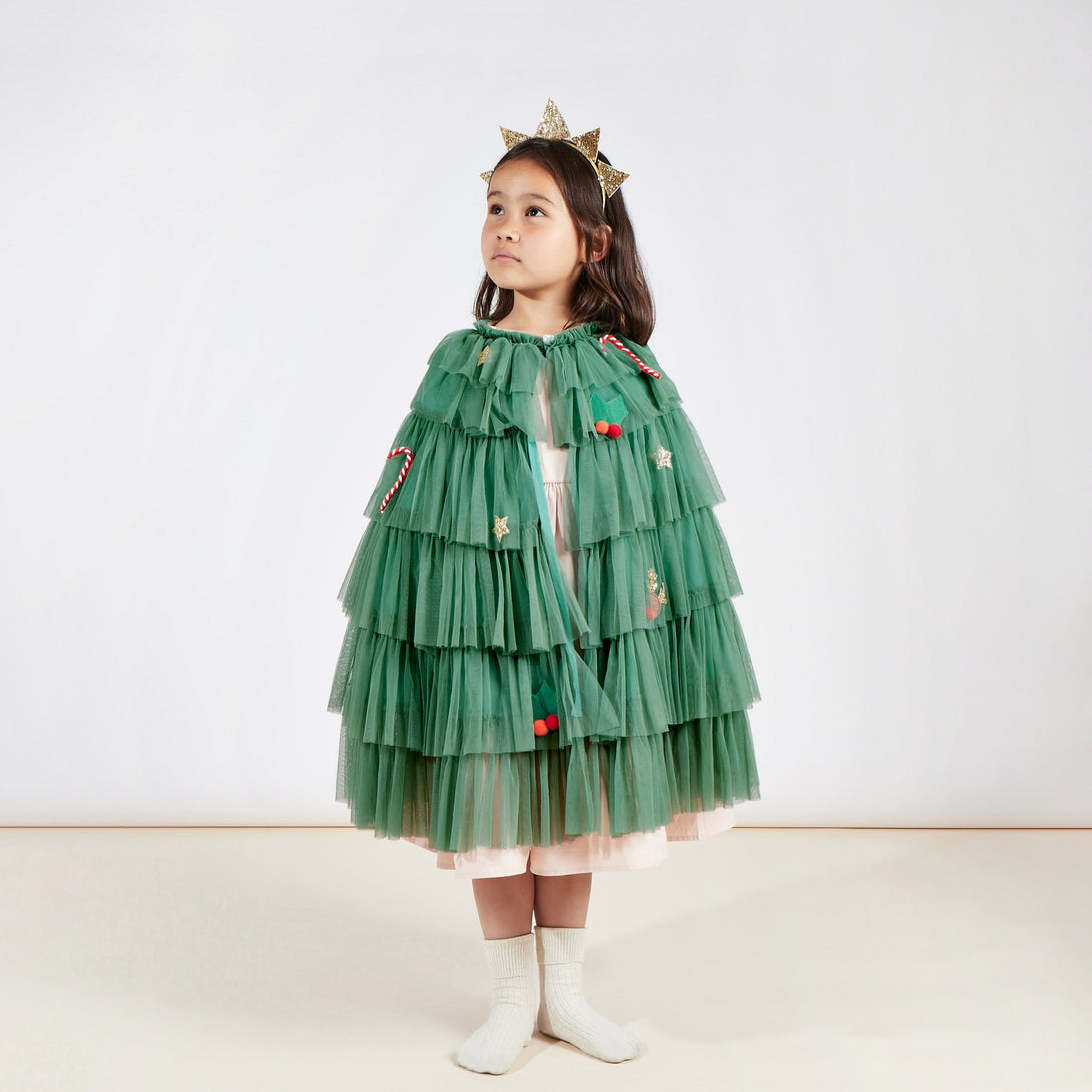This gorgeous Christmas tree costume is made from tulle with delightful Christmas embellishments,This gorgeous Christmas tree costume is made from tulle with delightful Christmas embellishments Image1
