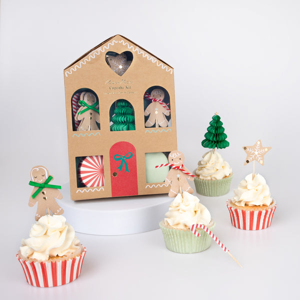 Our special Christmas party supplies include gingerbread house paper plates, party napkins, a cupcake kit and a fabulous festive garland. Image4