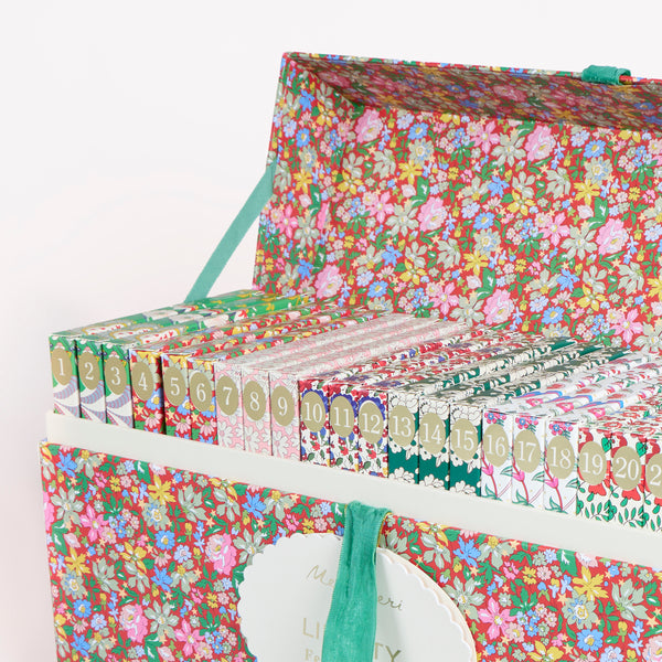 Our advent calendar is beautifully presented in a large Liberty print design box with 24 boxes inside containing stationery and decorations. Image4
