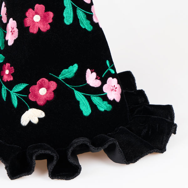 Our witch costume, made from luxurious black velvet with an embroidered floral design, features a cape, hat and a star topped wand. Image6