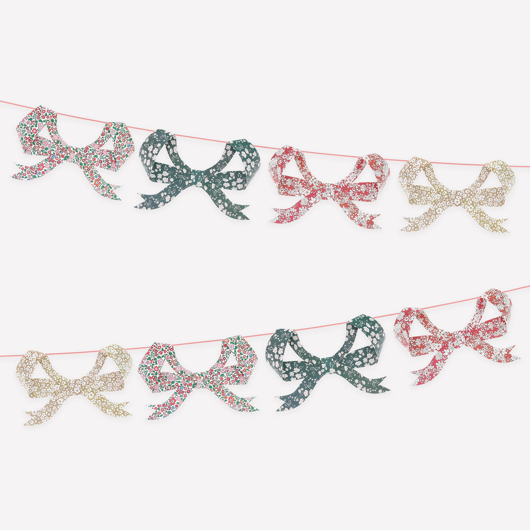 Our Christmas paper garland features 8 bows with joyful Liberty floral patterns and a soft velvet ribbon, for an elegant effect. Image1