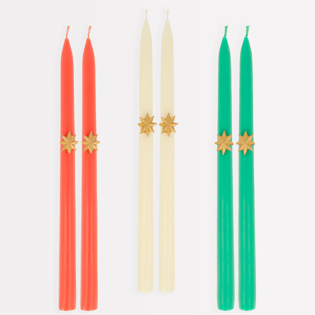 Our Christmas tall candles features gold wax stars and coloured wicks for a sensational effect, a great host gift.