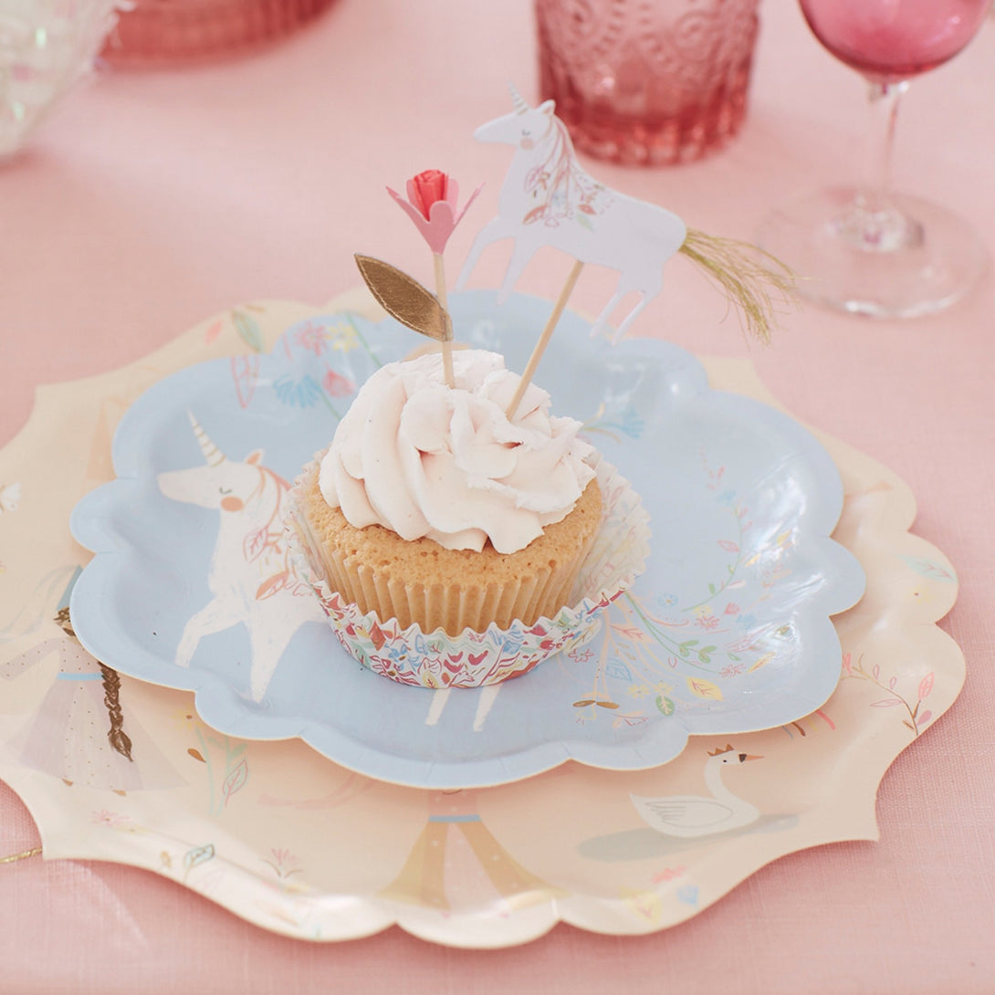These princess birthday party plates feature beautiful designs of princesses and unicorns with gold foil detail.