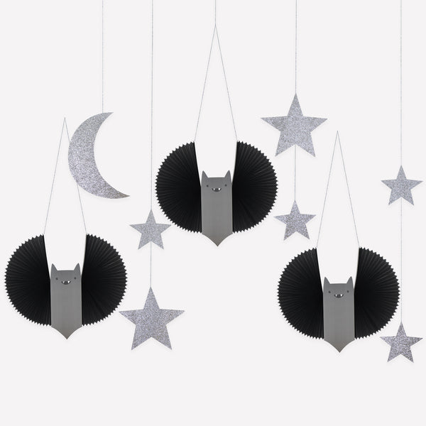 Our Halloween hanging decorations set features happy black bats with concertina wings and shimmering glitter stars and a moon. Image1