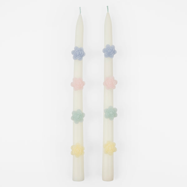 Our decorative candles are an elegant taper shape with 3D wax flowers.