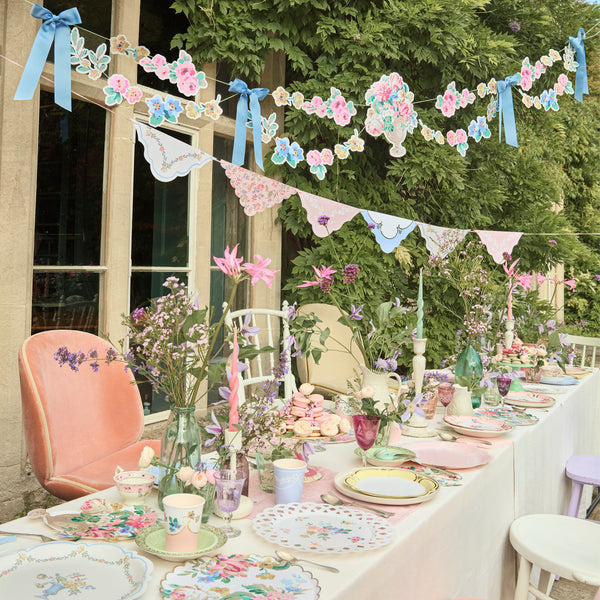 Our pretty garland set features floral pennants and pink velvet ribbons for hanging, perfect as bridal shower decorations and elegant gatherings. Image2
