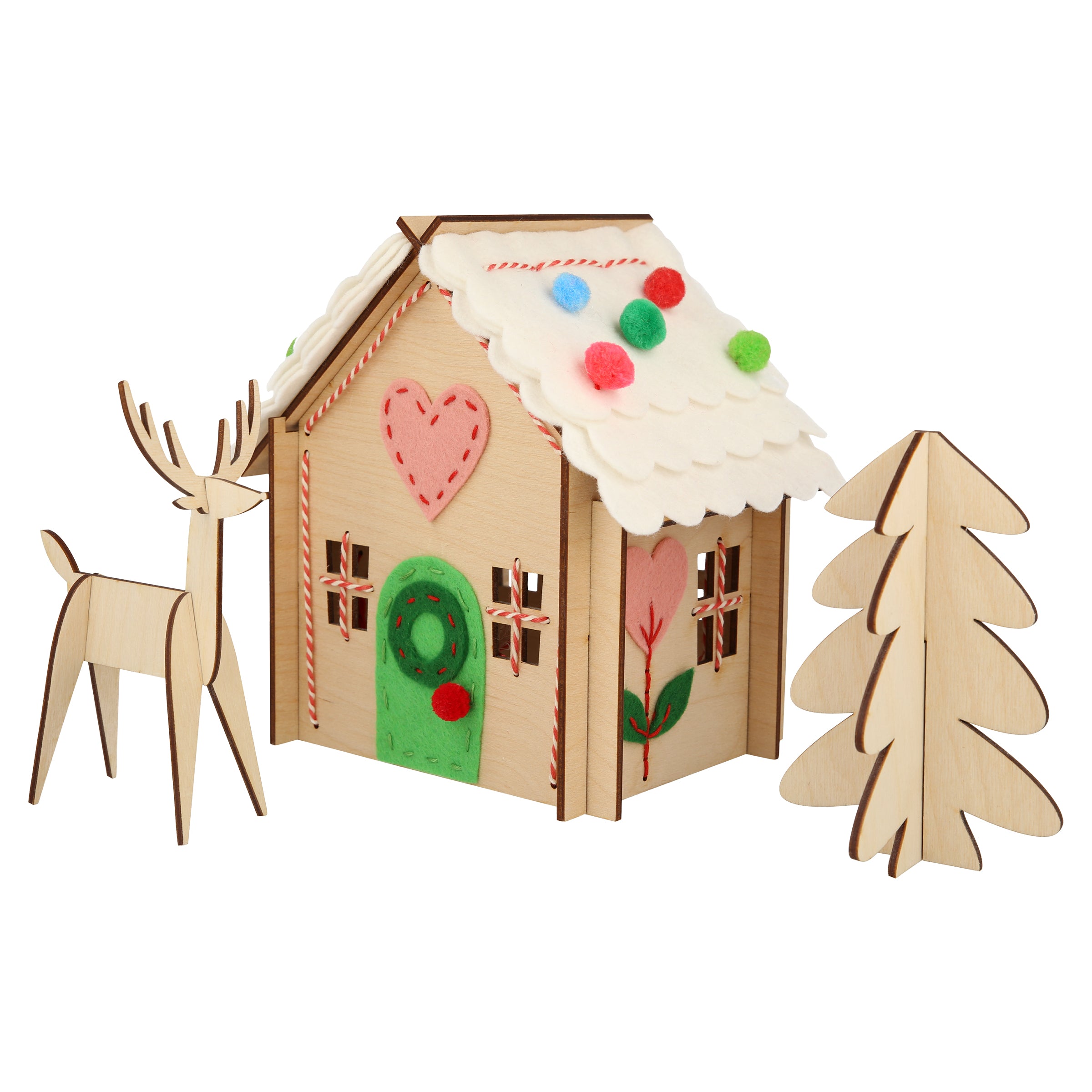 Our wooden gingerbread house features embroidery, felt and pompoms, with wooden reindeer. Perfect as a kids craft project.