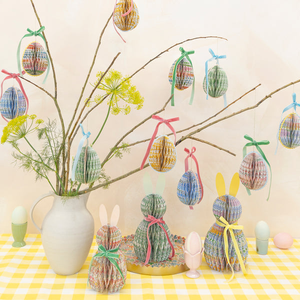 Our Easter egg decorations are made from honeycomb paper with Liberty floral designs, scalloped edges and velvet bows for luxe look. Image2