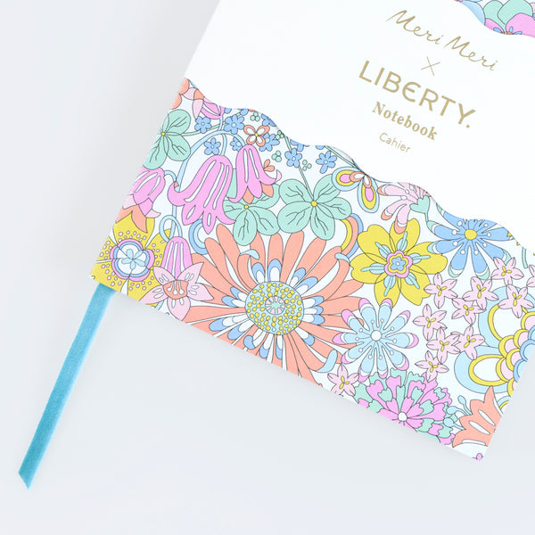 Our Liberty notebook features 152 lined pages, a Liberty floral print design cover and a soft velvet bookmark, a lovely gift for journalling. Image2