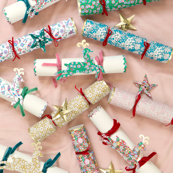 Make your Christmas dinner table look elegant with our luxury no snap Liberty crackers with velvet bows, origami stars and wonderful gifts. Image3