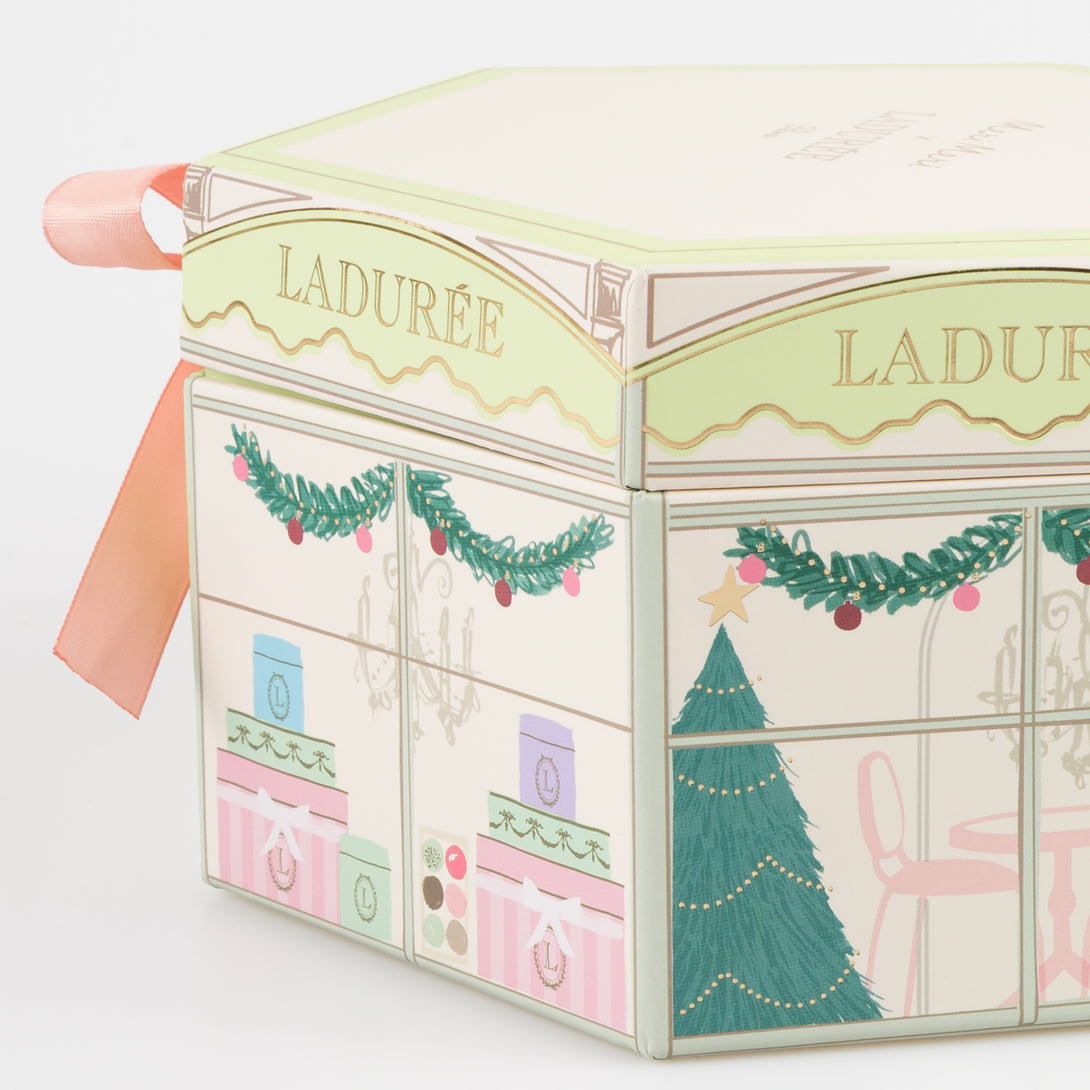 Kids who love accessories will adore our Laduree advent calendar which contains a charm bracelet, with enamel charms and cotton tassels.