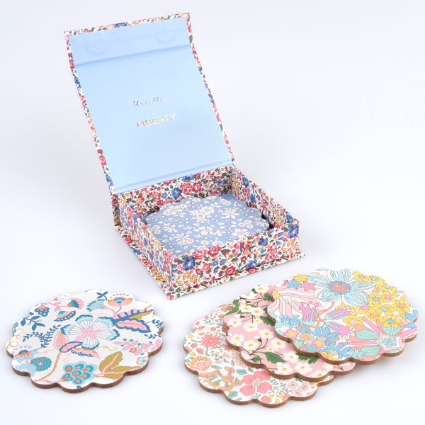 Our wooden coasters are made from a composite wood with floral Liberty prints, a laminated finish and a cork backing. Image2