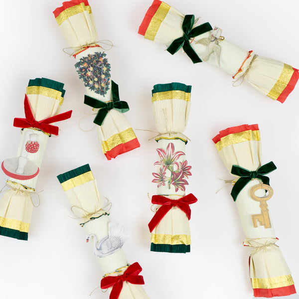 Our no snap Christmas crackers feature festive colours, keyring gifts and chic John Derian inspired embellishments for a fairytale feel. Image5