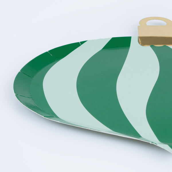 Our Christmas paper plates, in the shape of Christmas decorations, have bright stripes of green, mint, red and pink for a fun look. Image2