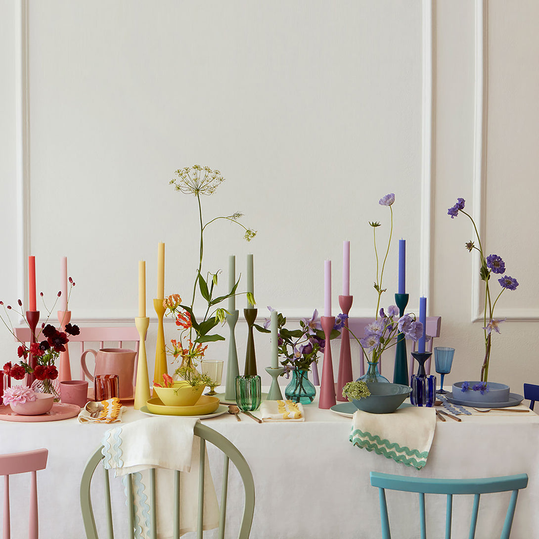 Our decorative candles in coral, pink, blue, sage and yellow will add colour to your party table.