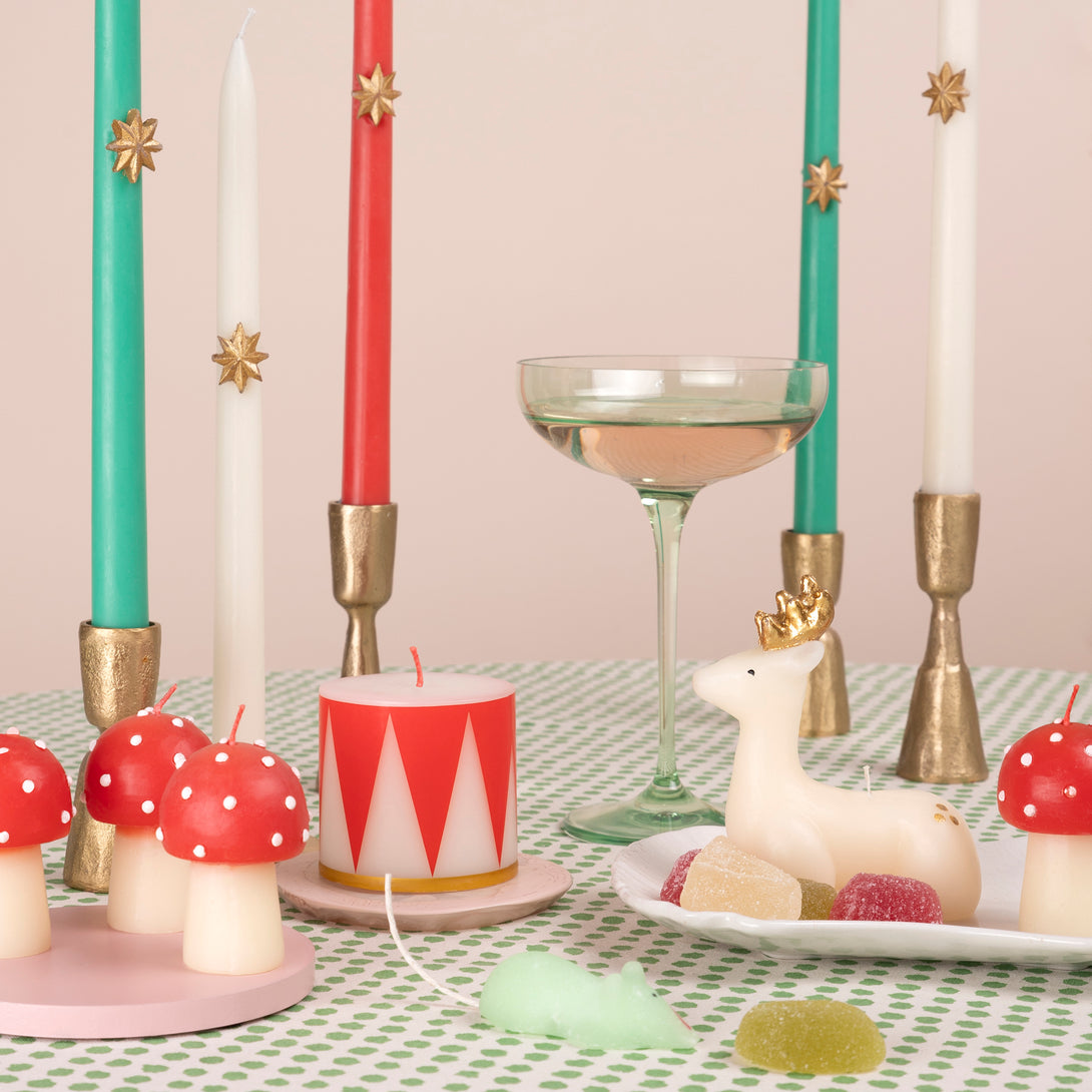 Our Christmas tall candles features gold wax stars and coloured wicks for a sensational effect, a great host gift.