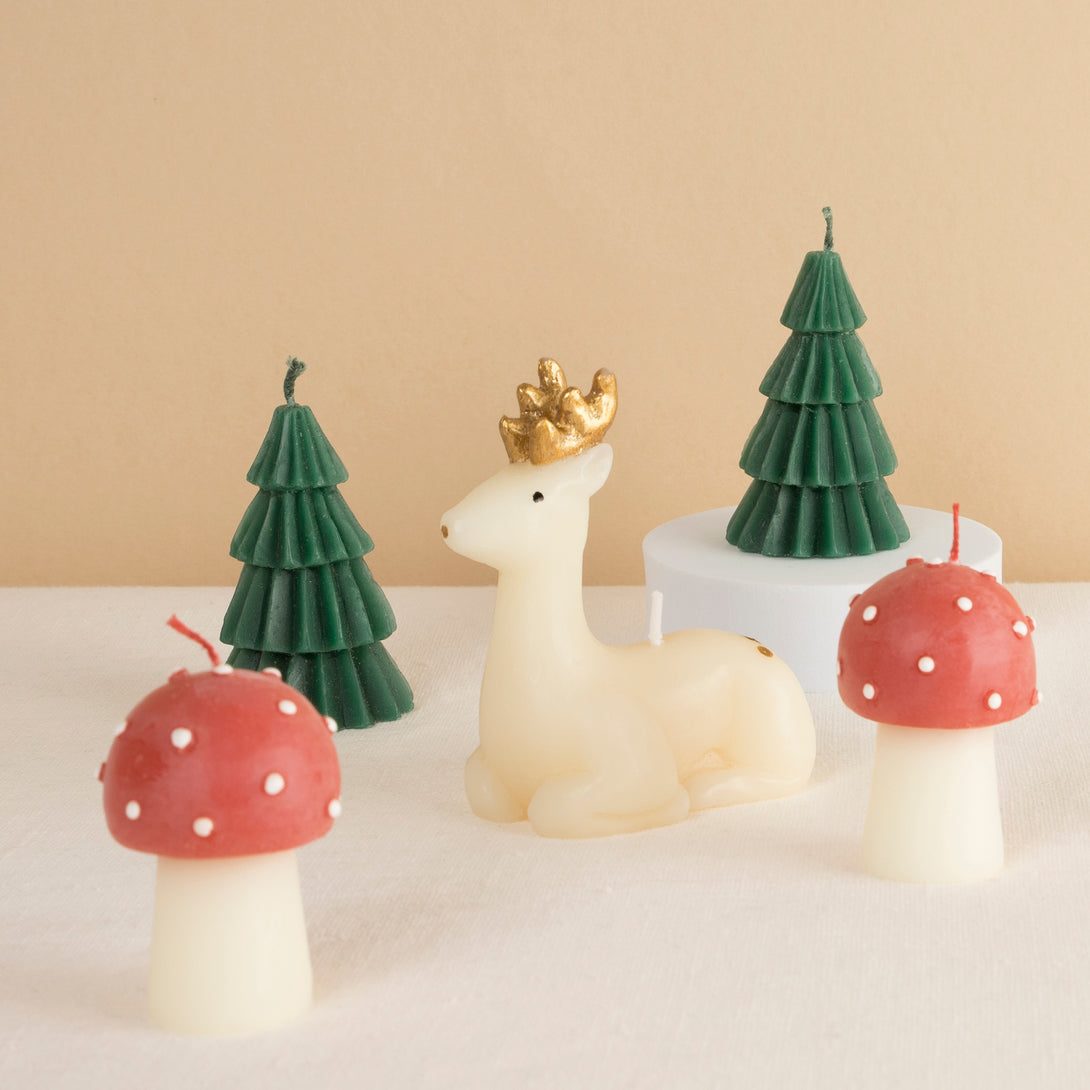 Our festive candle set, with Christmas tree candles, reindeer and mushrooms, make a great Christmas host gift.