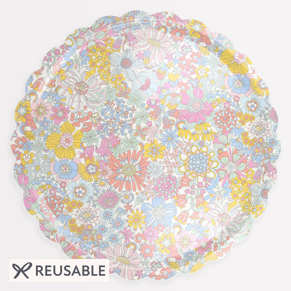 Our round tray has a floral Liberty print design, and is made from birch veneer plywood with a melamine coating, for practicality and style. Image1