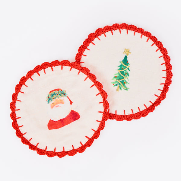 Our fabric cocktail napkins for Christmas are made with a linen and cotton blend, festive motifs, red crochet borders and gold embroidery. Image4