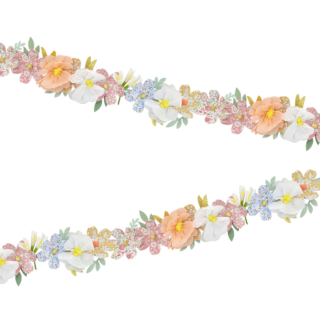 Our floral garland features pretty Liberty prints, making it wonderful for home decoration or as a baby shower decoration.