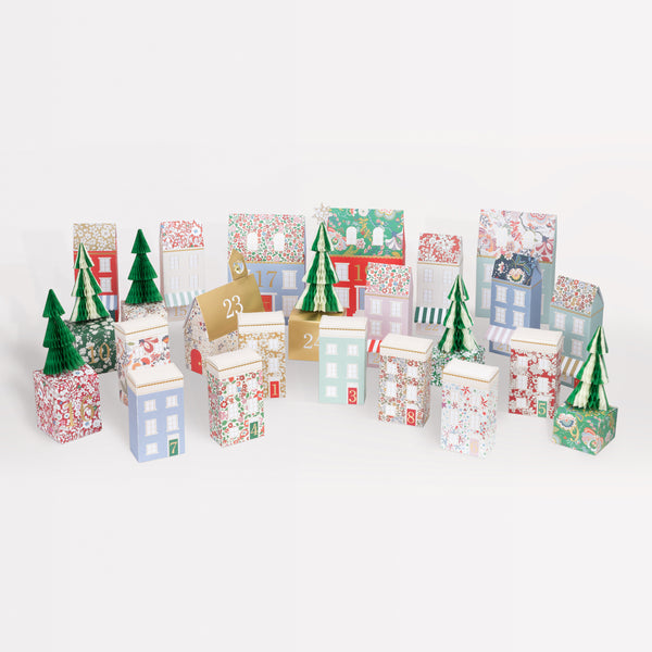 Our Christmas advent calendar creates a 3D village scene, with Liberty prints, shiny gold foil details and honeycomb trees, to fill with fun gifts. Image1