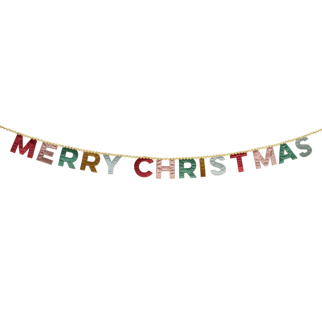 Our Merry Christmas garland is made in velvet with a mix of traditional and modern colours and metallic gold ric rac.