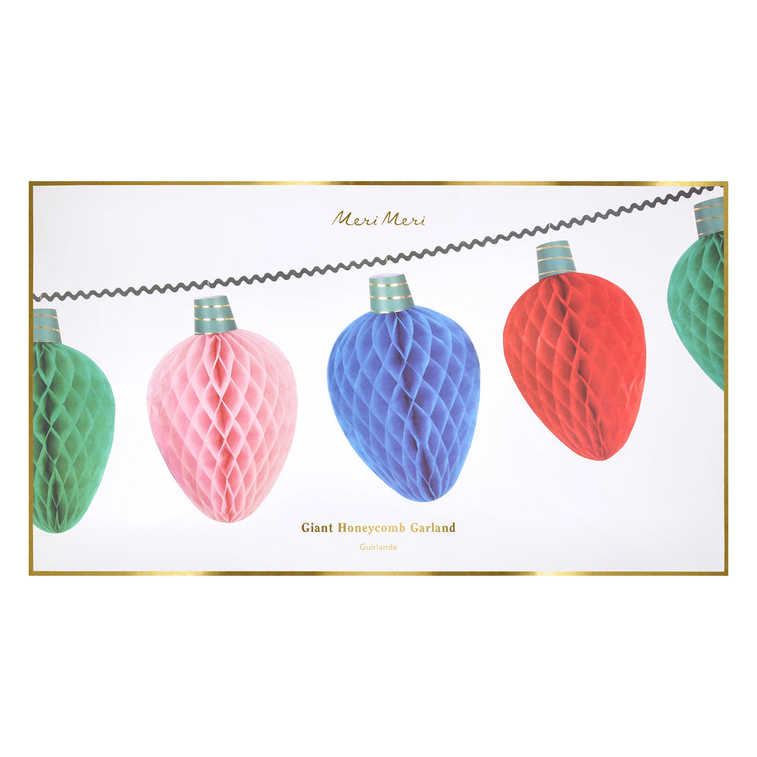 Our Christmas garland, made from honeycomb paper, features 3D details of fairy light designs in festive colours. Image4