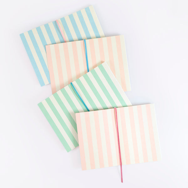 Keep notes or a journal in our beautiful notebook with a floral Liberty print design and a pink velvet ribbon bookmark, a stylish gift for a writer. Image3