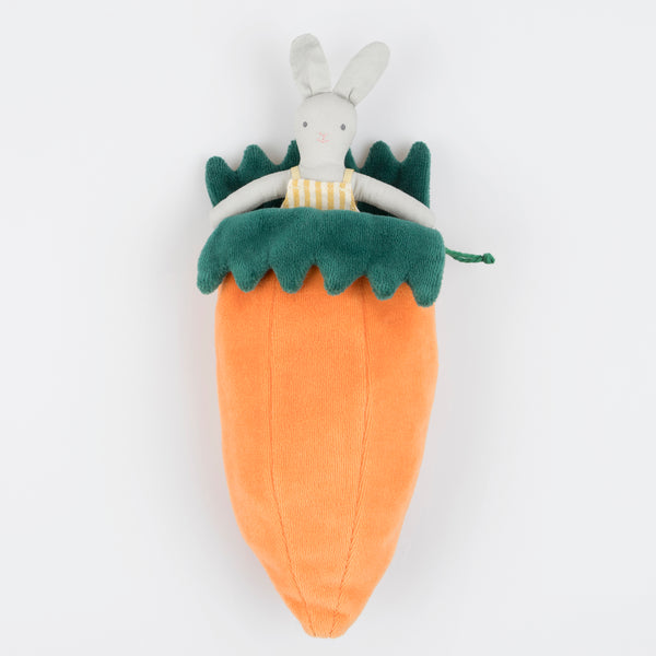 Our mini fabric bunny toy lives in a velvet carrot pouch for lots of imaginative fun.