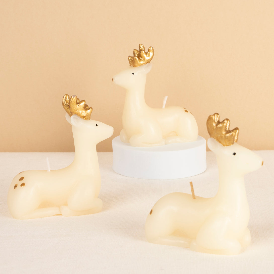 Our reindeer candles, with hand-painted gold details, make a great Christmas host gift.