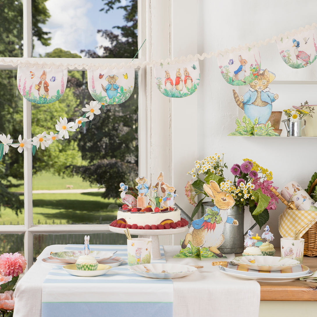 Our Peter Rabbit garland, crafted from fabric, is perfect as a baby shower garland or first birthday garland.