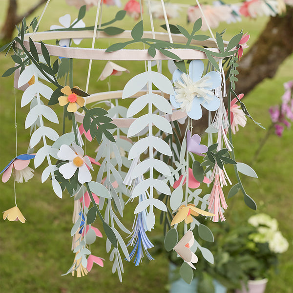 Our beautiful paper chandelier is crafted from paper flowers and leaves and wooden hoops. Image4
