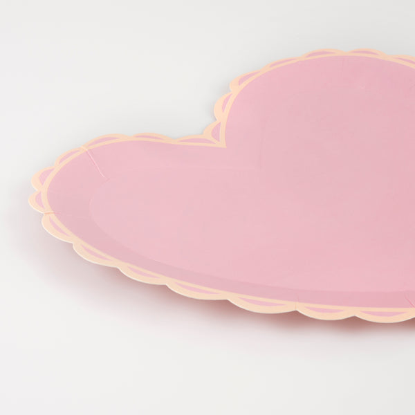 Our dinner plates, in heart shapes, feature a range of pretty pastel colours and a scalloped border. Image2