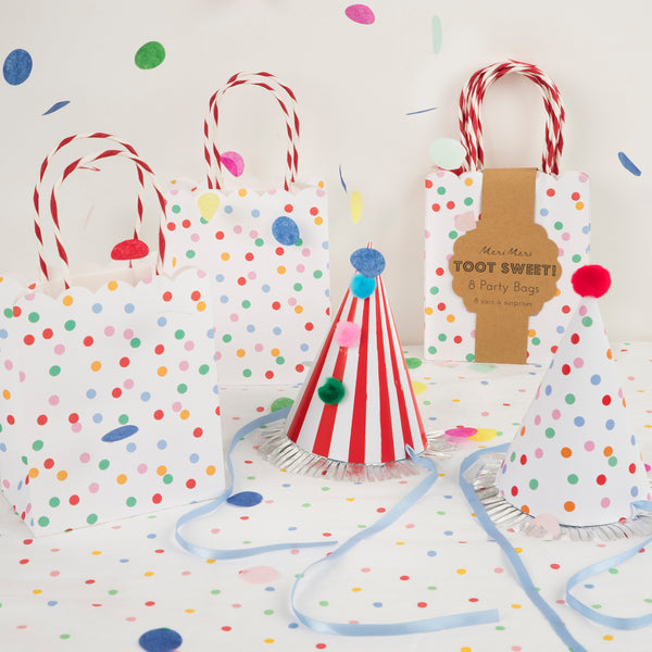 Our classic spots and stripes birthday party set contains a spotty paper tablecloth, party confetti, party hats and party bags. 