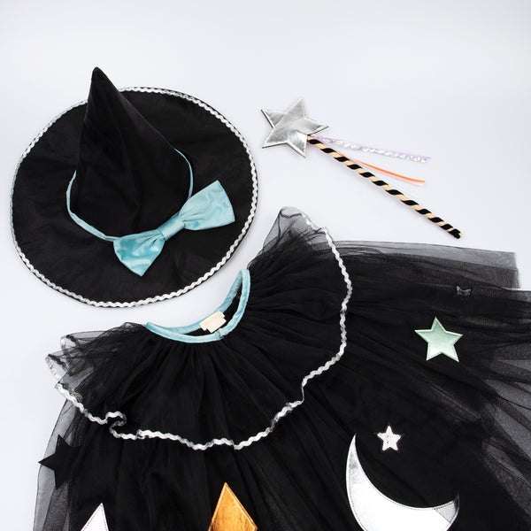 Our luxury witch costume set includes a tulle cape, an witch hat with a velvet bow and a colourful ribbon wand with a silver sequin star. Image2