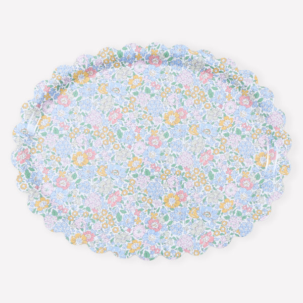 Our wooden tray, made in a stylish oval shape, features a Liberty print design of blue, pink and yellow florals. A wonderful host gift. Image1